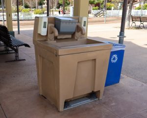 portable hand wash station next to a building